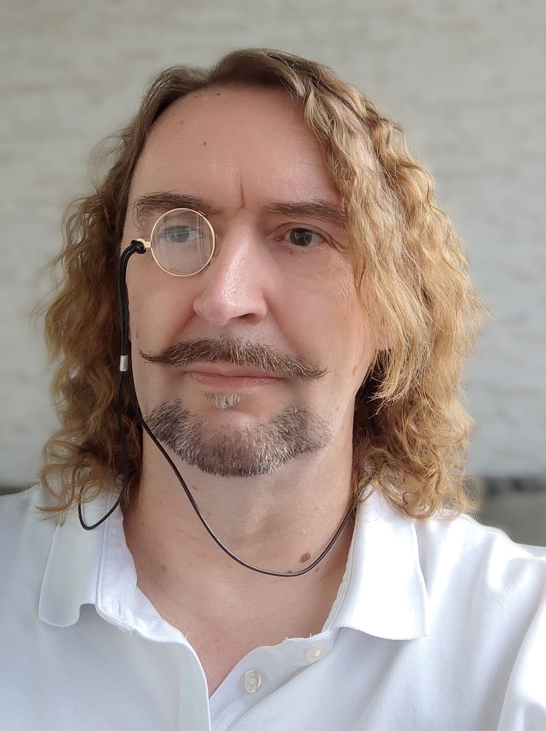 prescribed monocle worn by model with beard